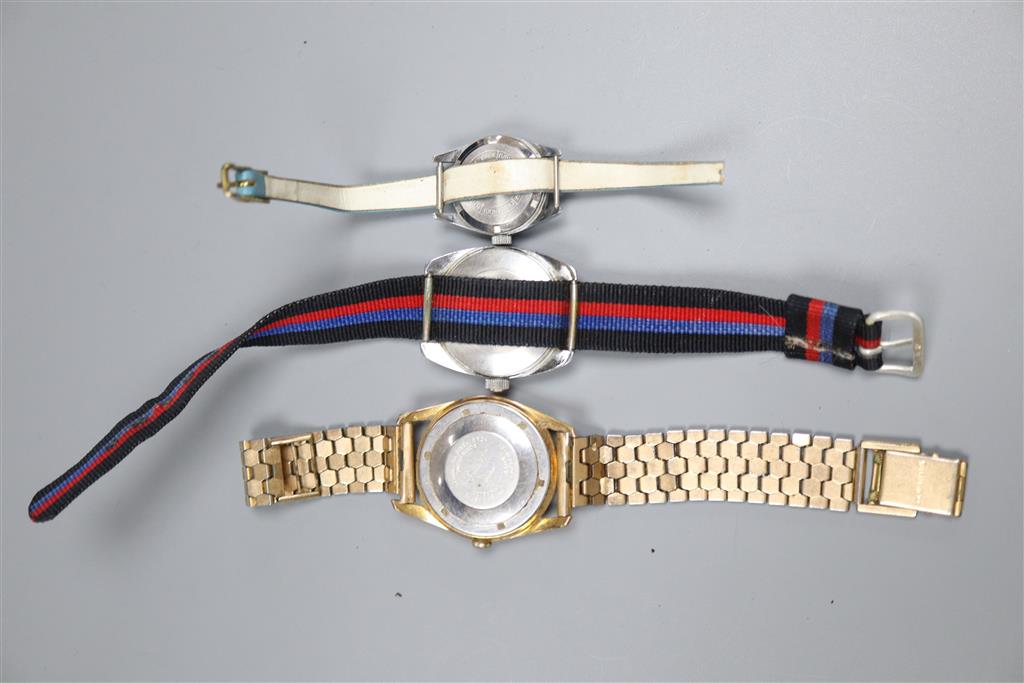 Three assorted wrist watches including Felca, Timex and ladys Mickey Mouse.